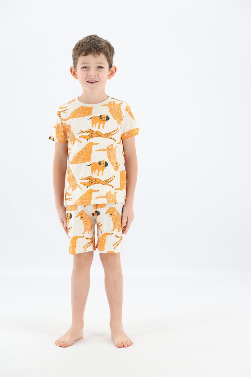 Ecru/oranje pyjama met hondenprints offre à 14,99€ sur Bel&Bo