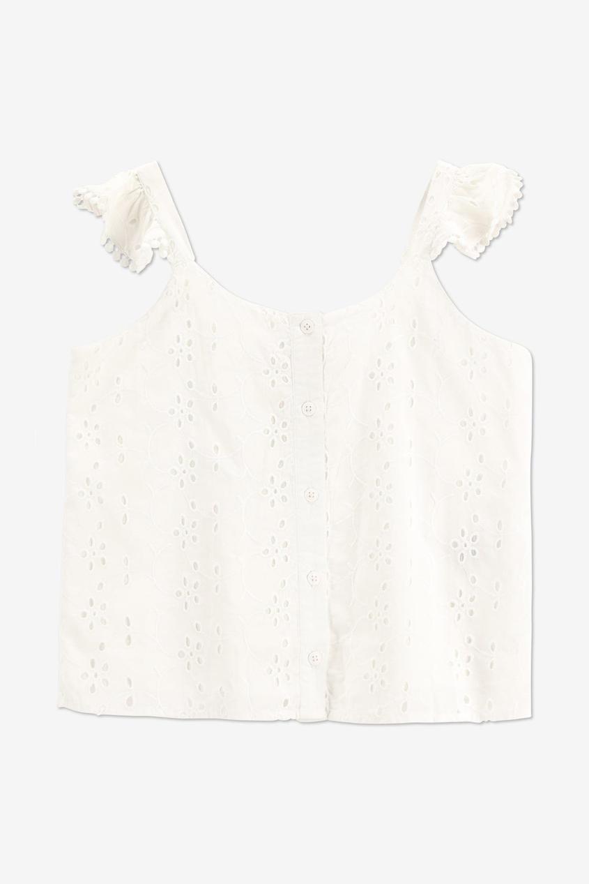 Witte mouwloze blouse in broderie anglaise offre à 22,99€ sur Bel&Bo