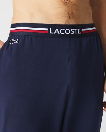 Pantalon de pyjama ceinture tricolore en jersey offre à 50€ sur Lacoste