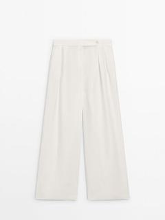 Pantalon large en lin à pinces offre à 89,95€ sur Massimo Dutti